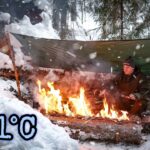 -31ºC Solo Camping in Survival Shelter from Poncho Tent During Storm – Long Fire – ASMR