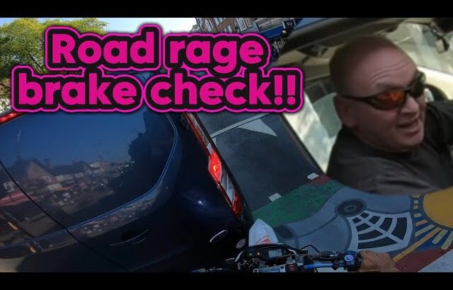 Road rage brake check motorcycle crash!!